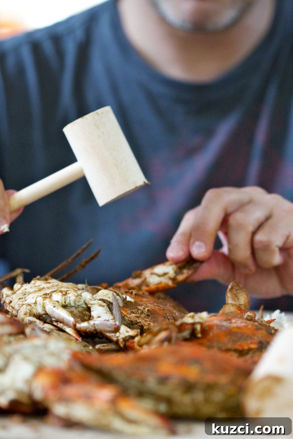Steamed crabs and wooden mallet