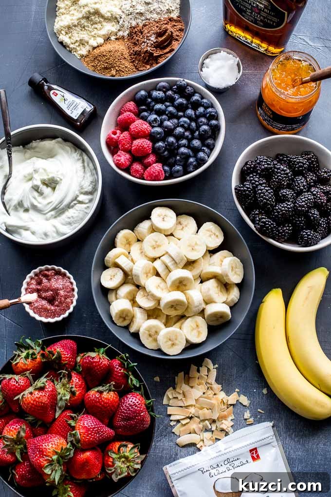 Overhead view of ingredients to make mini fruit tarts.