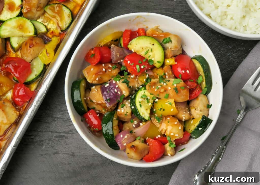 Sheet Pan Chicken and Vegetables: A Kabob Alternative 11 Sheet Pan Chicken & Veggies served in a bowl with rice