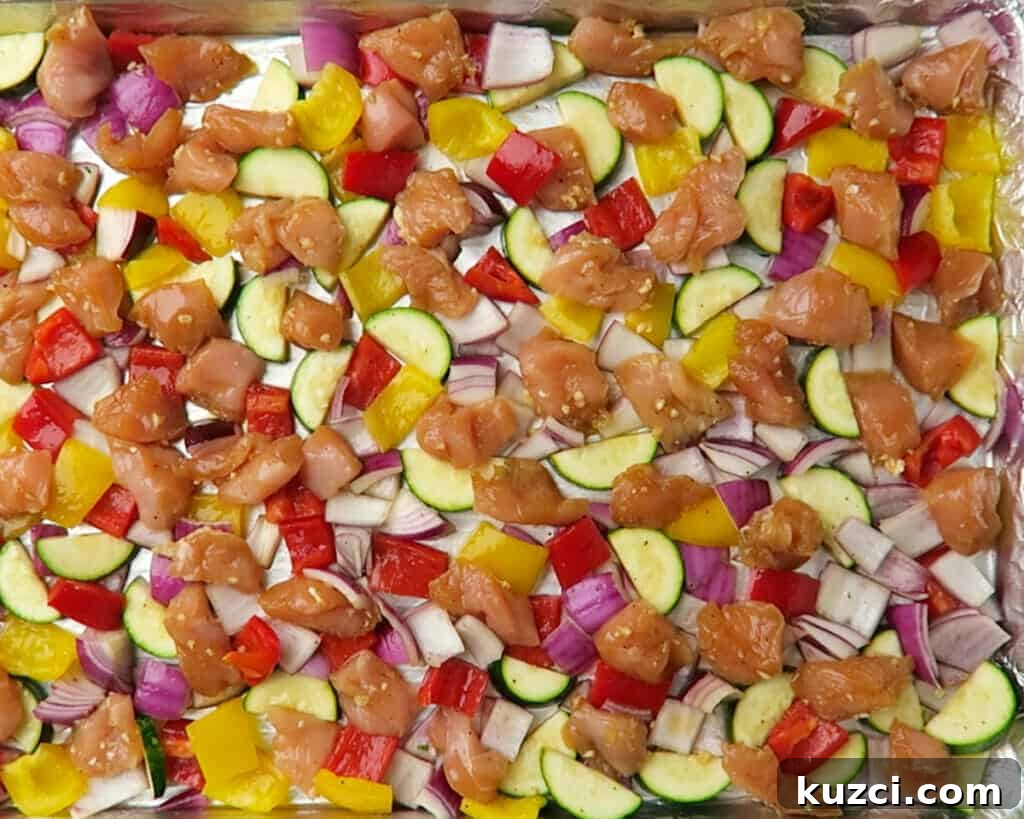 Sheet Pan Chicken and Vegetables: A Kabob Alternative 8 Chicken and vegetables arranged on baking sheet