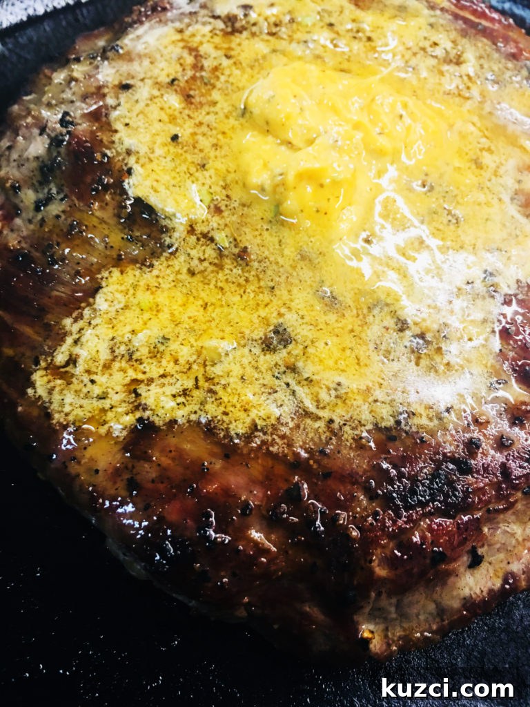 Cajun Garlic Butter Flank Steak Recipe 7 Cajun garlic butter melting over flank steak