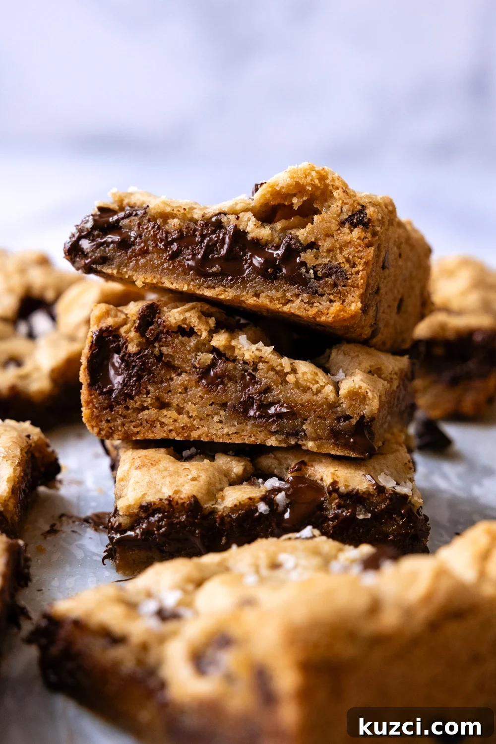 Gluten-free chocolate chip cookie bars with crisp edges and gooey centers.