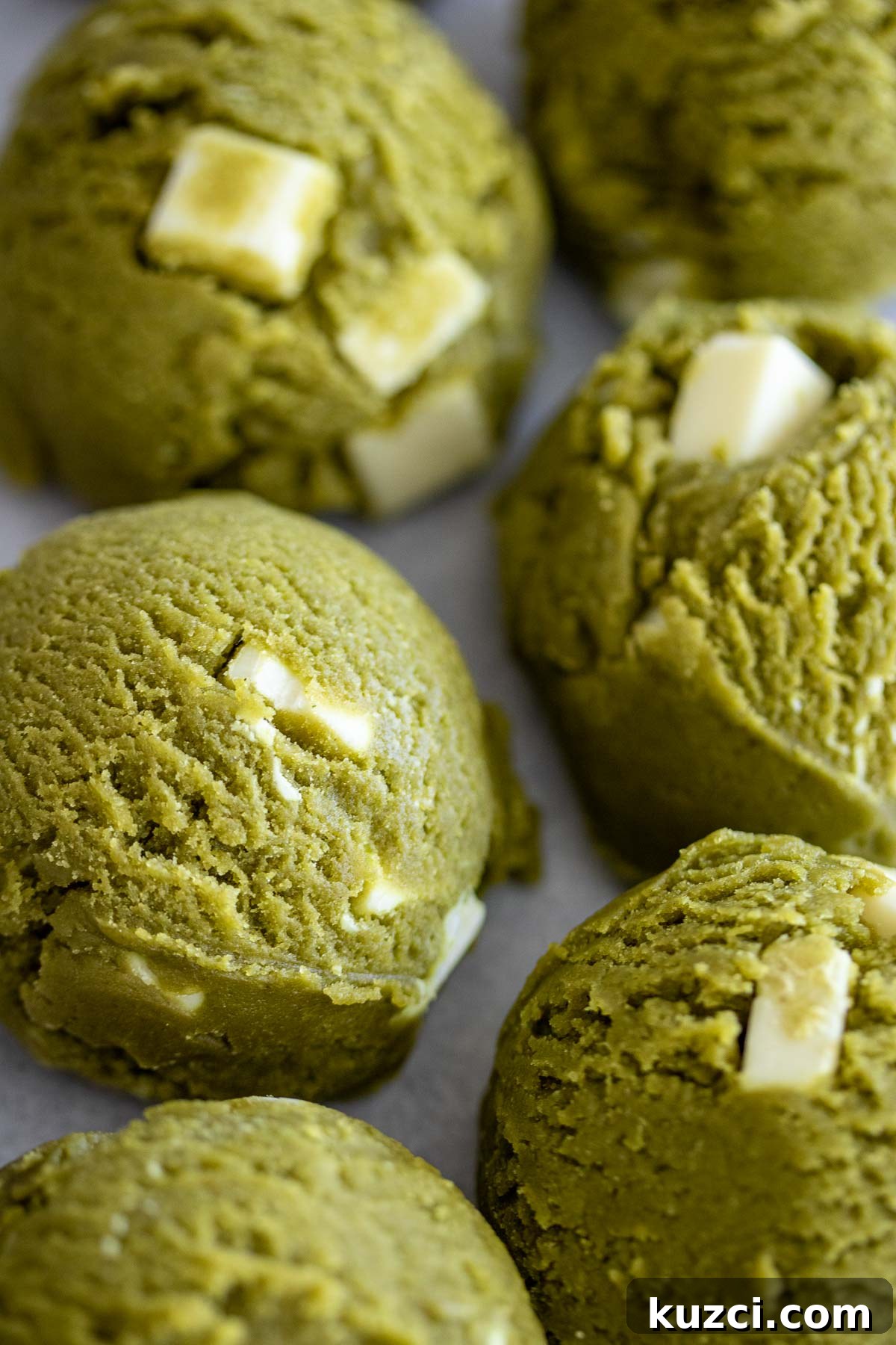 Homemade Matcha White Chocolate Chip Cookies Recipe 11 Shaped balls of matcha dough.