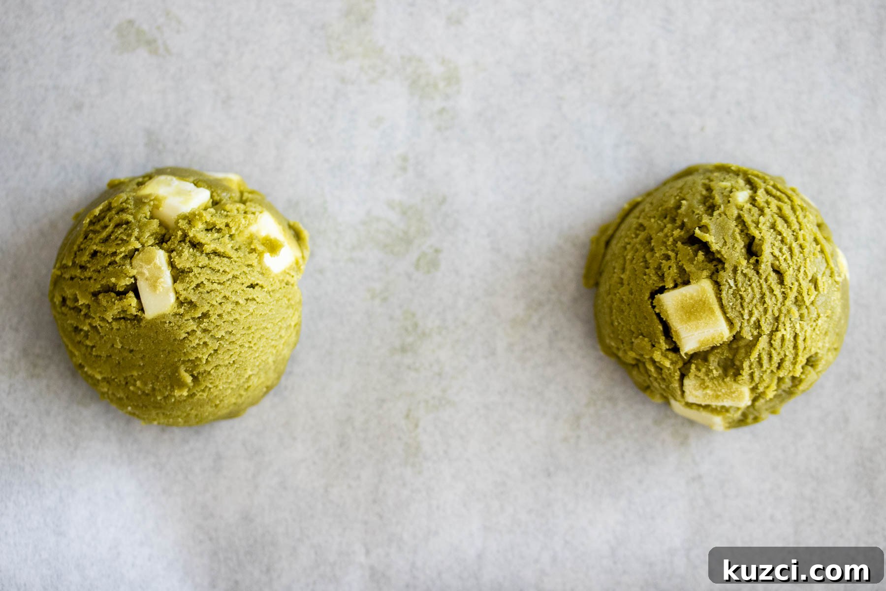 Homemade Matcha White Chocolate Chip Cookies Recipe 9 Shaped cookie dough ready to bake.