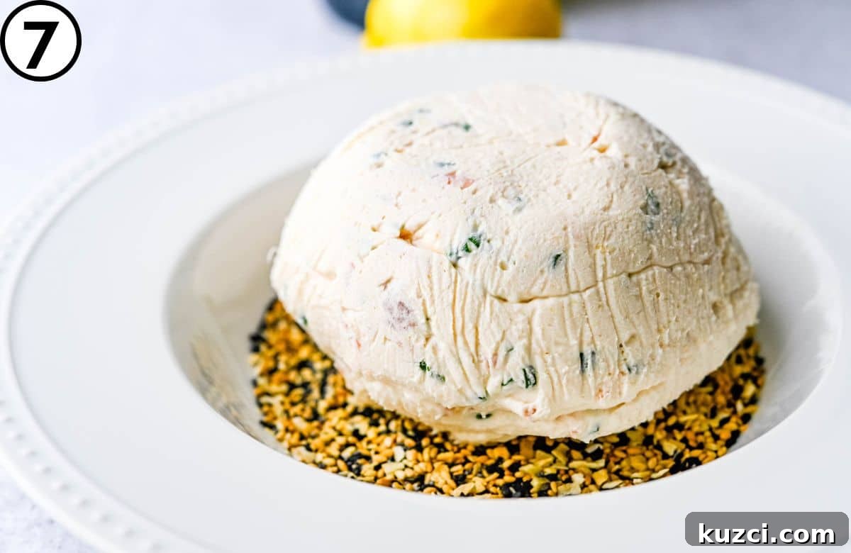 Smoked Salmon Cheese Ball with Dill and Capers 9 Coating the cheese ball recipe with Everything Bagel seasoning.