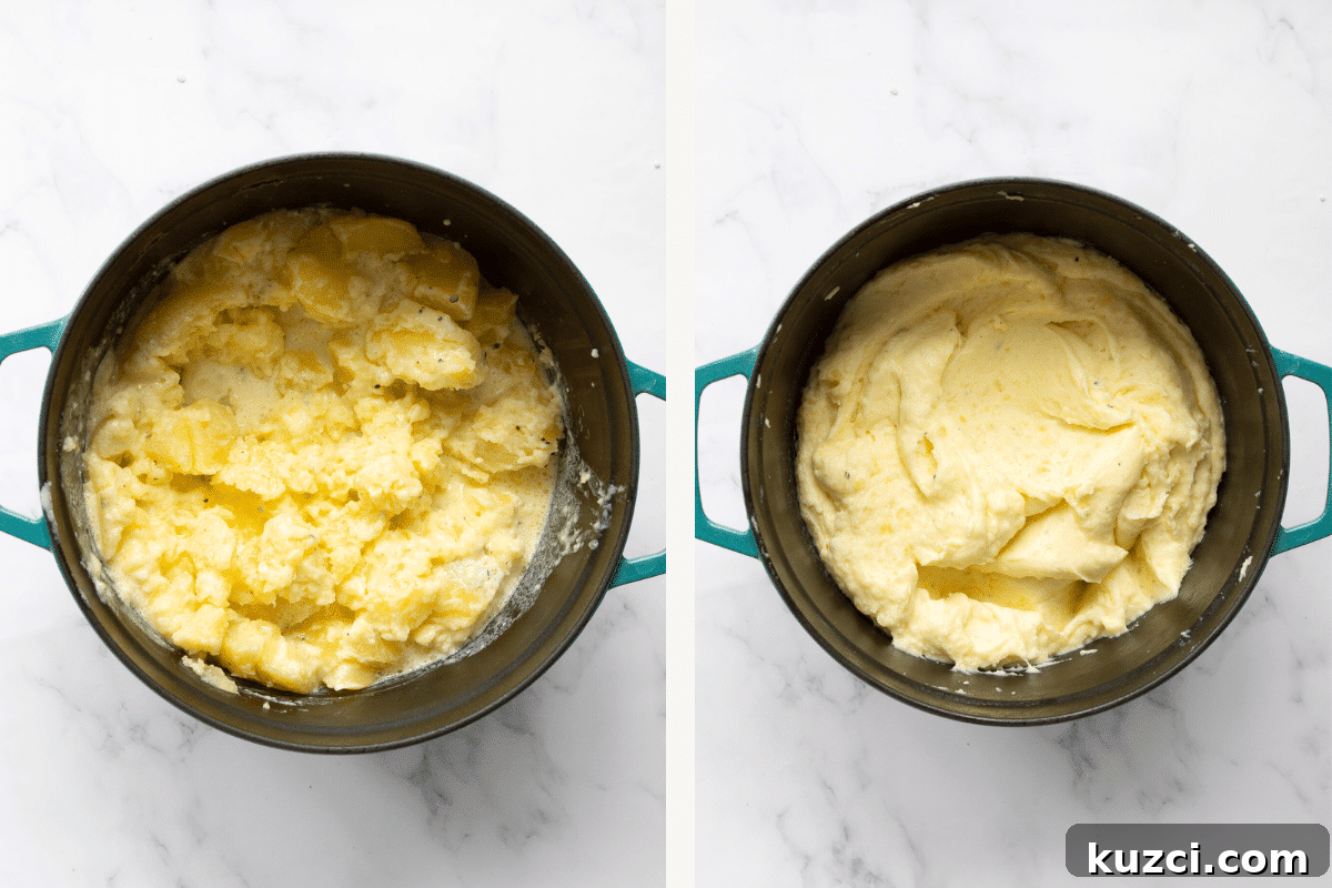 Mashing potatoes in a large pot.
