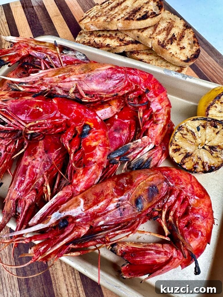 Garlic Butter Grilled Prawns Recipe with Lemon 2 Grilled prawns on the plate