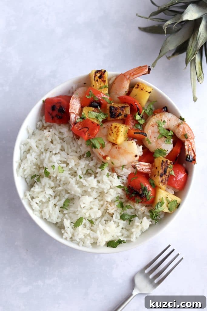 Sheet Pan Shrimp with Pineapple and Garlic Lime Glaze 7 Pineapple shrimp rice bowl with teriyaki sauce.