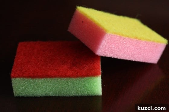 child stacking colourful dollar store sponges