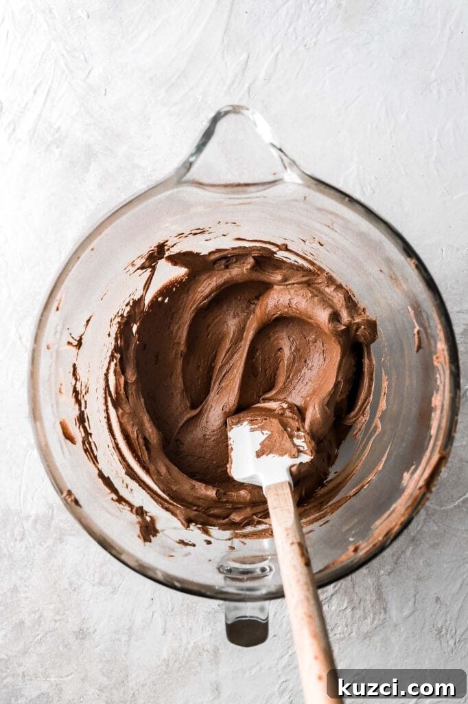 Classic Birthday Cake with Two-Ingredient Frosting 8 melted chocolate & whipped butter combined