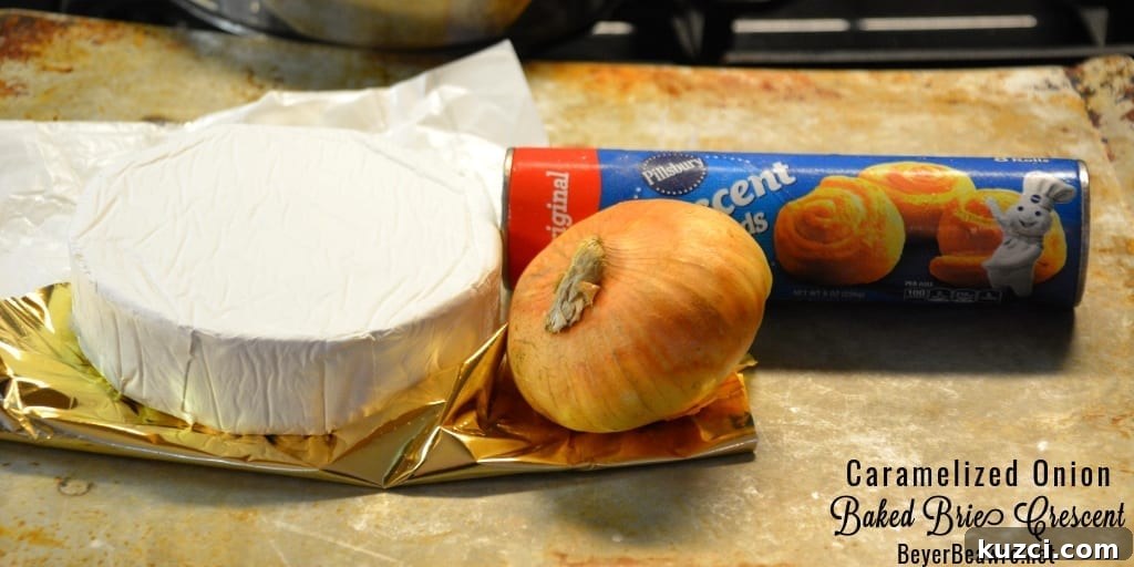Caramelized Onion Baked Brie Crescent Ring (Brie en Croute) 6 Caramelized onion baked brie crescent round is a simple combination of butter and onions browned until caramelized and piled into a brie round wrapped in crescent rounds.