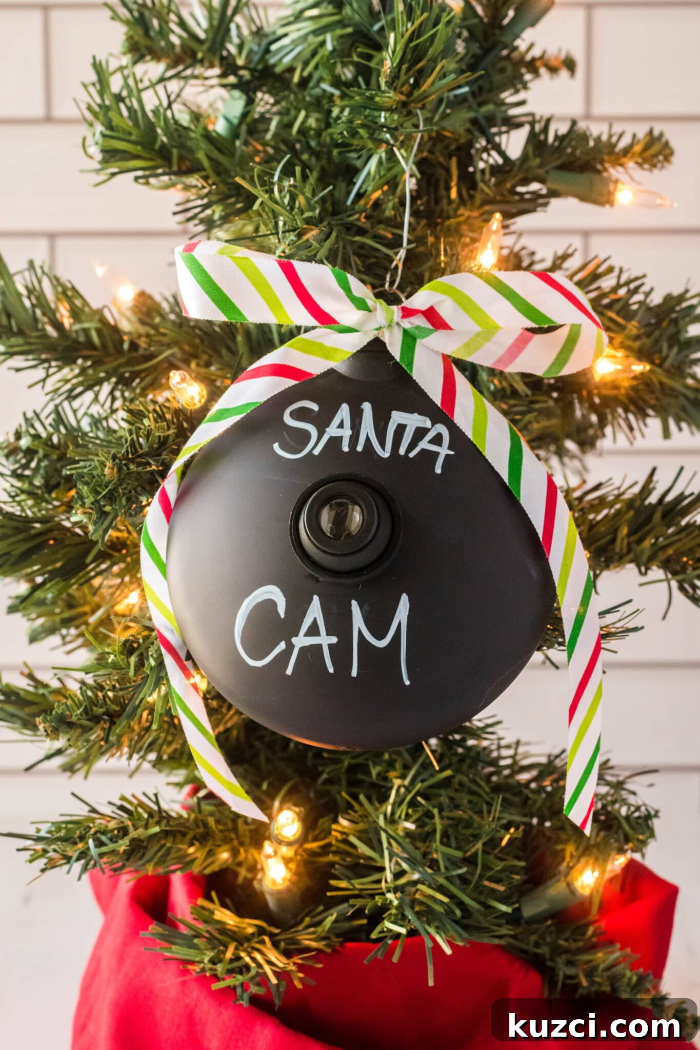 How to Make a Santa Cam Ornament for Your Christmas Tree 2 santa cam ornament hanging on a Christmas tree