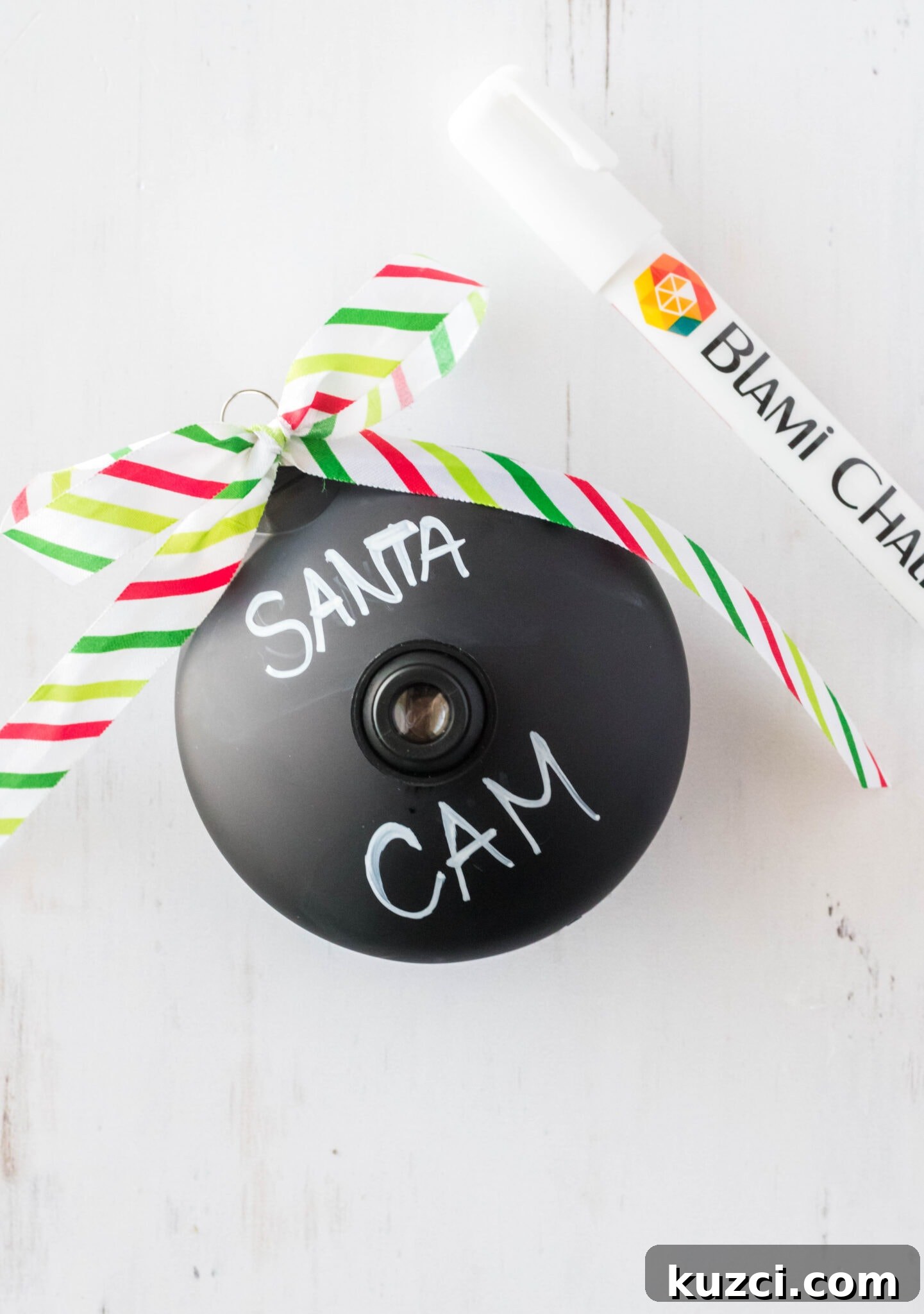 How to Make a Santa Cam Ornament for Your Christmas Tree 7 black ornament that says Santa Cam on it