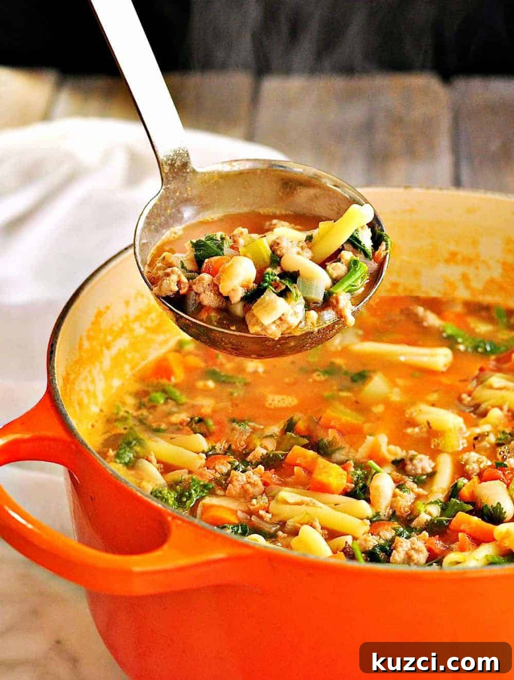 Classic Italian Pasta e Fagioli Soup Recipe 2 Pasta e Fagioli being served from a ladle