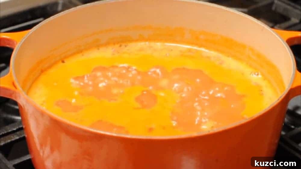 Classic Italian Pasta e Fagioli Soup Recipe 7 Add tomatoes then simmer