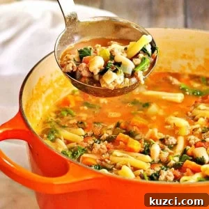 Classic Italian Pasta e Fagioli Soup Recipe 10 Pasta_e_Fagioli being served from a ladle