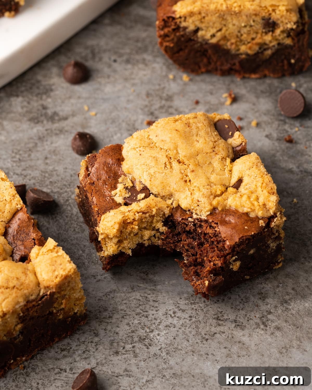 Easy Homemade Brookies - The Best Mash-Up Dessert Bar Recipe! Overhead view of a homemade brookie bar with a bite missing.