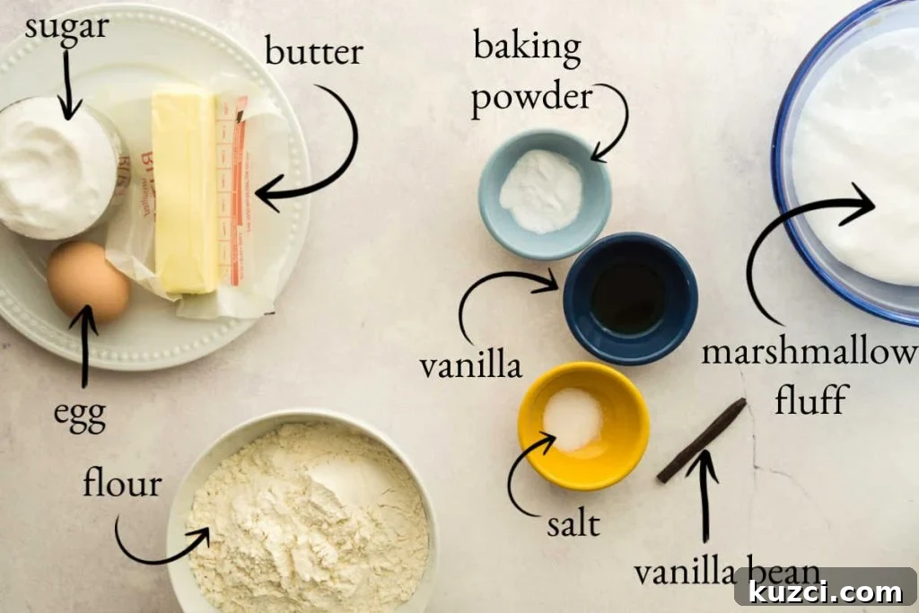 white surface with butter, sugar, egg, flour, vanilla, and other baking ingredients