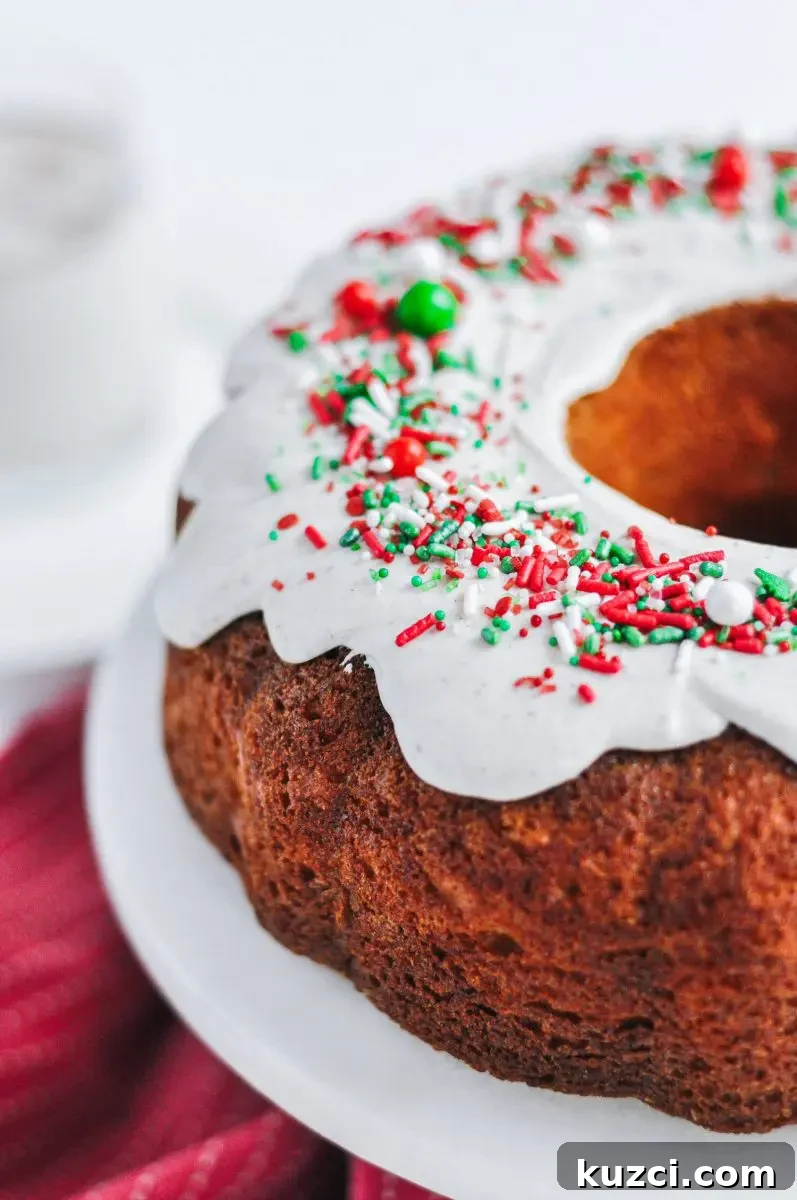 Holiday Eggnog Bundt Cake Recipe with Rum Glaze 3 Bundt cake on a stand