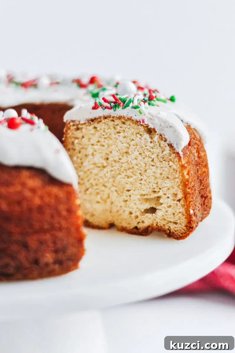 Holiday Eggnog Bundt Cake Recipe with Rum Glaze 5 Eggnog glaze pouring