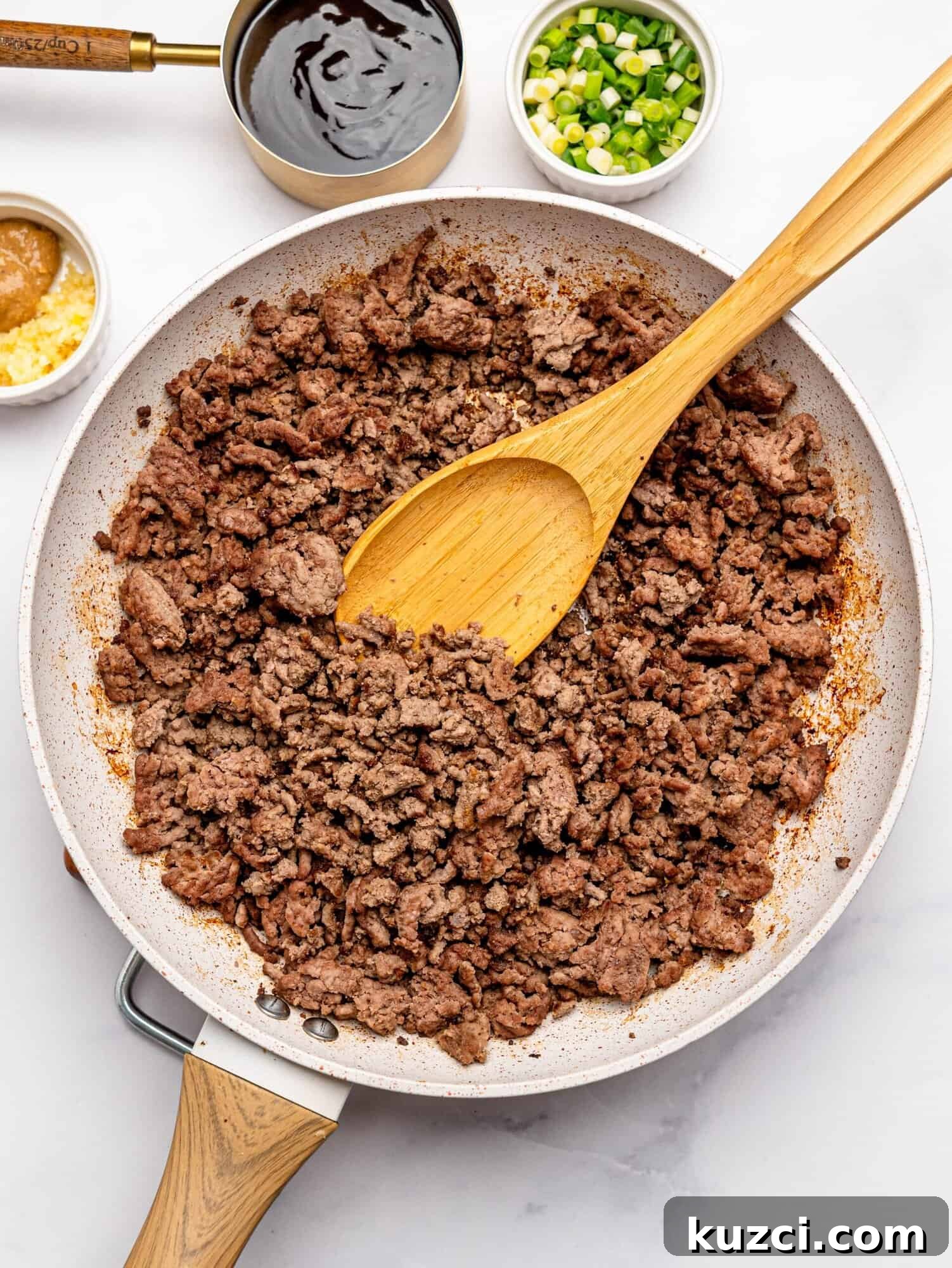 High Protein Teriyaki Beef Bowls for Meal Prep 9 Cooked lean mince in a frying pan.