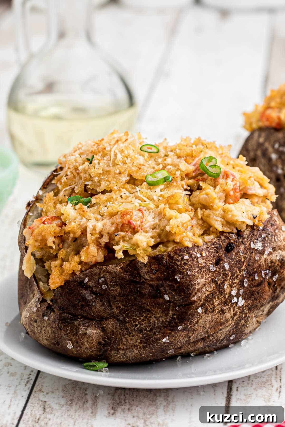 Crawfish-Stuffed Baked Potatoes Recipe 2 Close up shot of a crawfish baked potato.