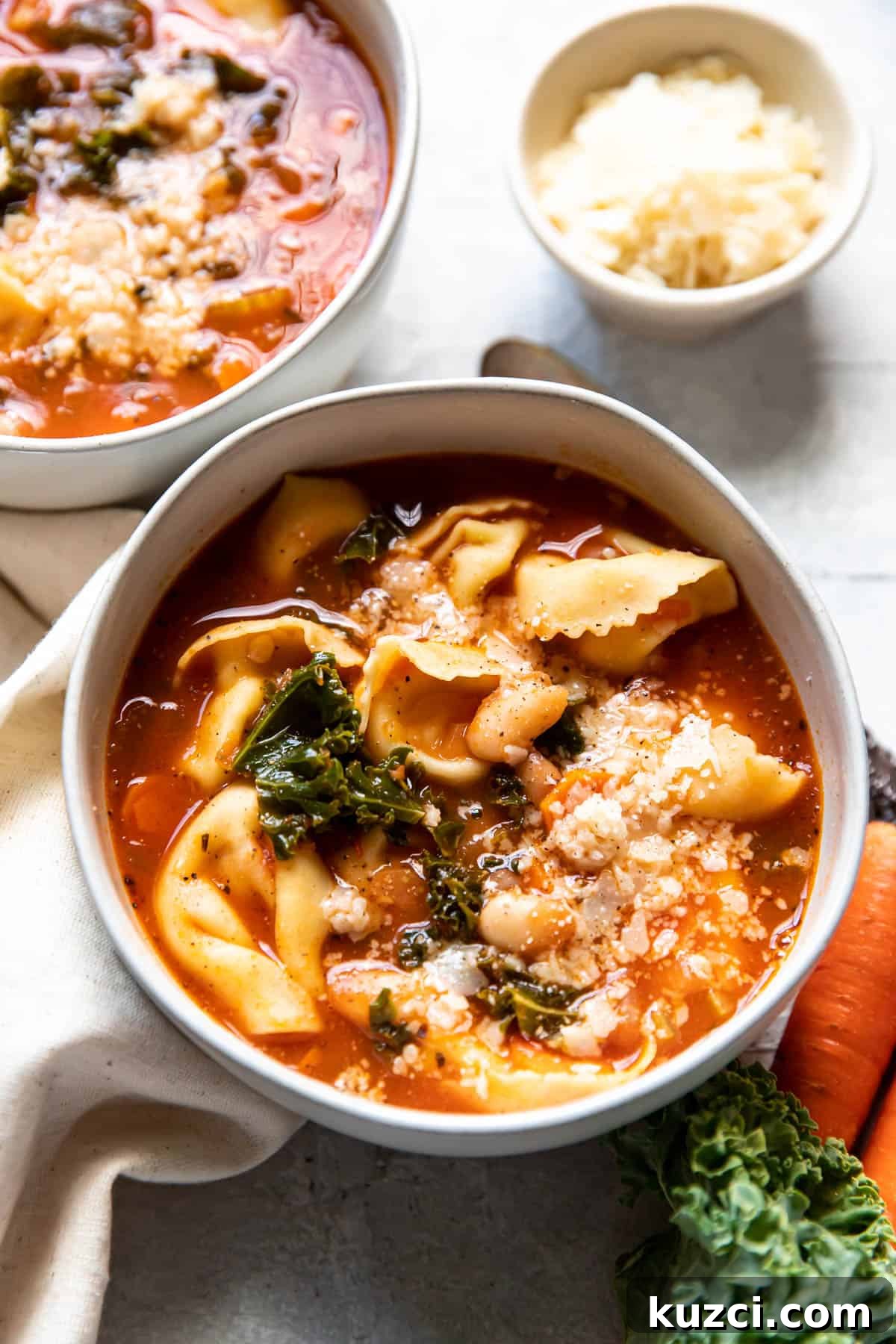 tuscan tortellini soup in a bowl.