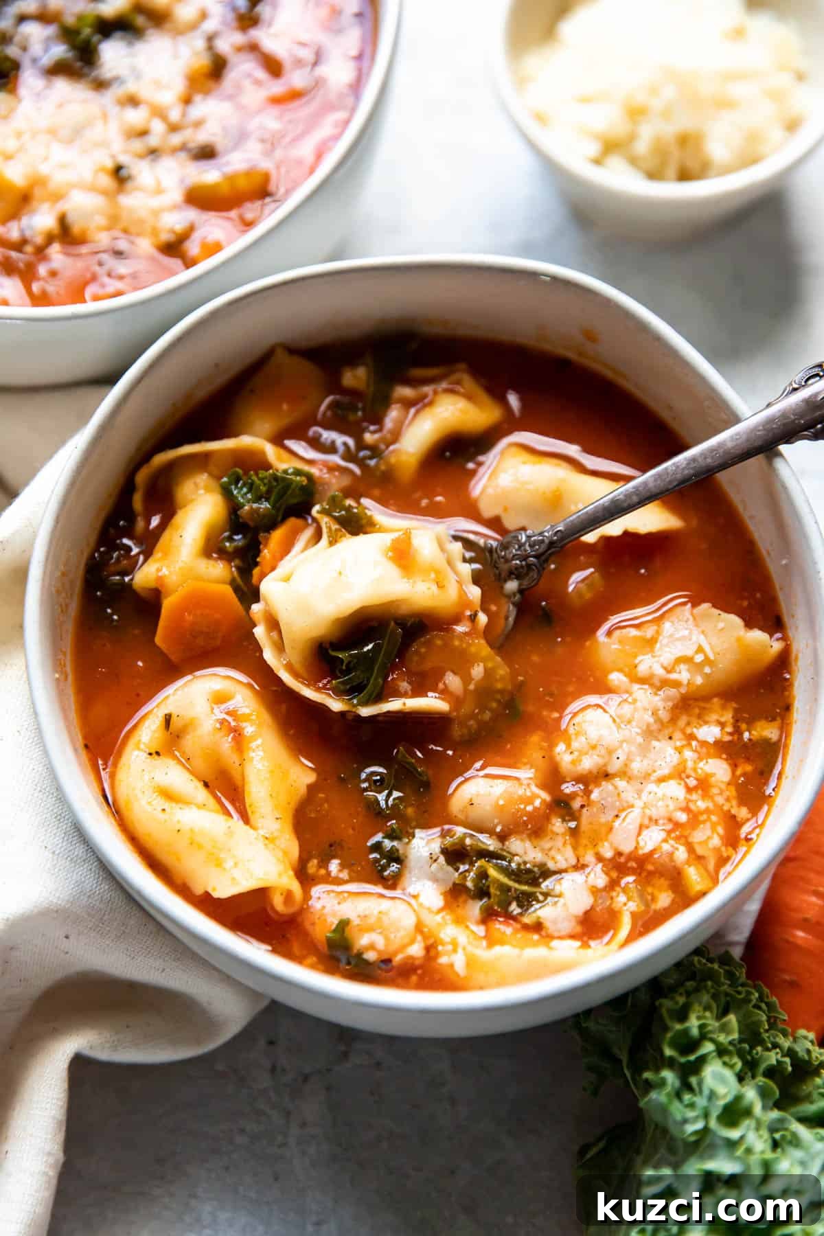 tuscan tortellini soup in a bowl.